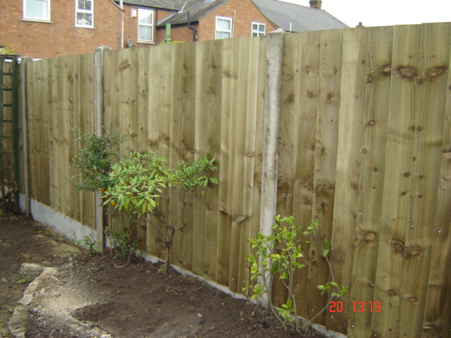 Wood Close Board Featherboard with Concrete Posts and Kickboards Wellesbourne